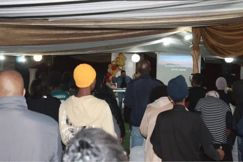 Services Congregation members at Latter Glory House in Kimberley engaged in heartfelt worship during a service.