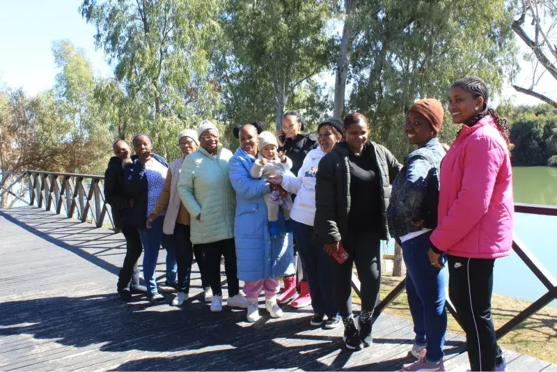 Services Latter Glory House members in Kimberley on a group excursion, fostering community and connection.